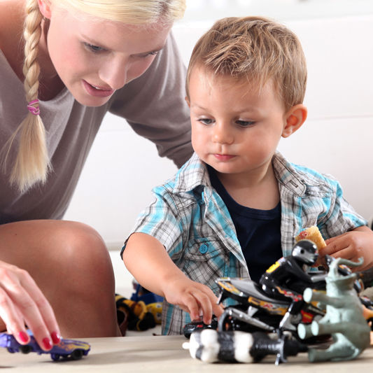 Teacher & Kid Playing